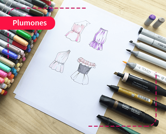 Plumones y una hoja con dibujos